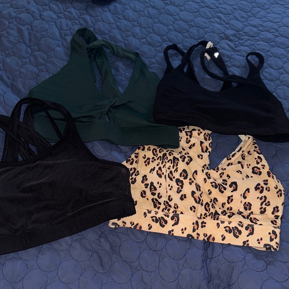 Set of Four Fabletics Sports Bras size Large- Black, Green, Leopard Print